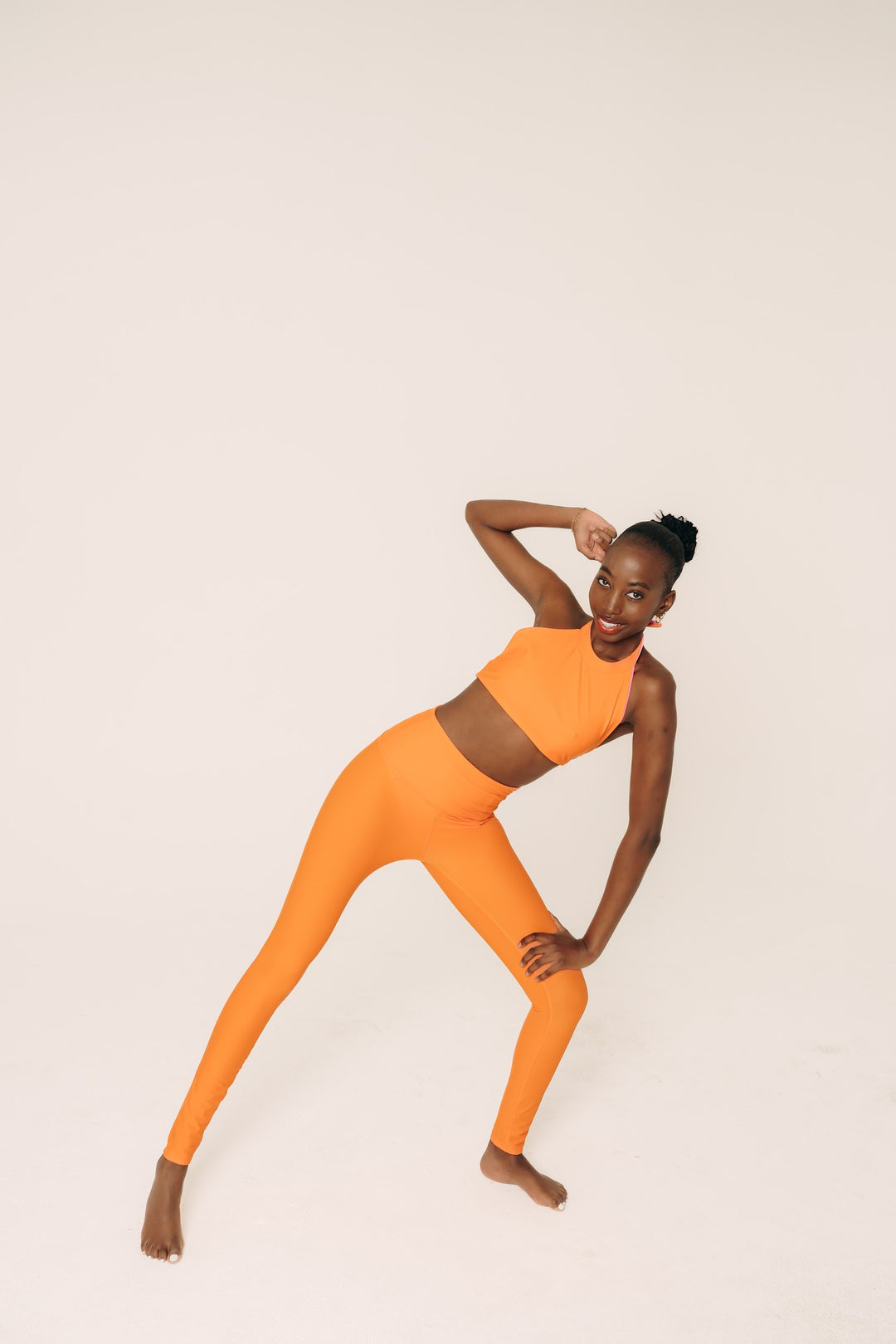 Women's UPF 50+ Sun Protective Leggings - Tangerine