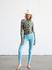 WOMEN'S PULLOVER RASH GUARD - PEACOCK